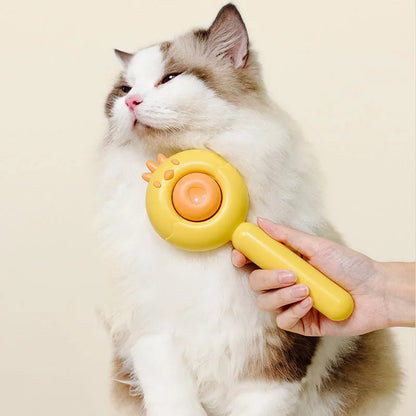 Purple, white, or yellow self-cleaning pet grooming brush with stainless steel bristles.