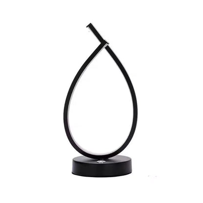 Black or white water drop shaped USB table lamp with touch control measuring 30cm tall
