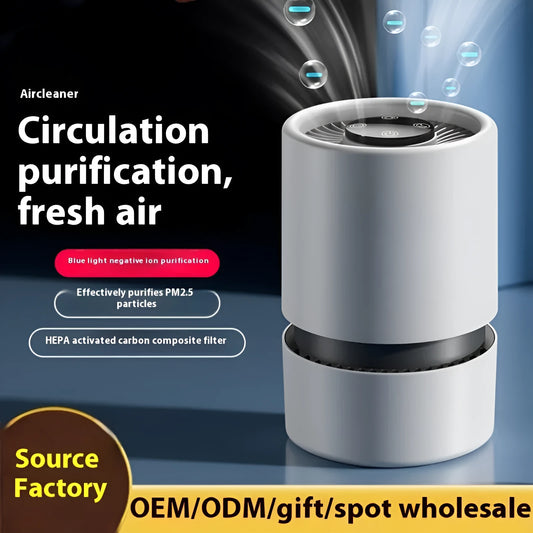 White desktop air purifier with USB cable on a wooden desk
