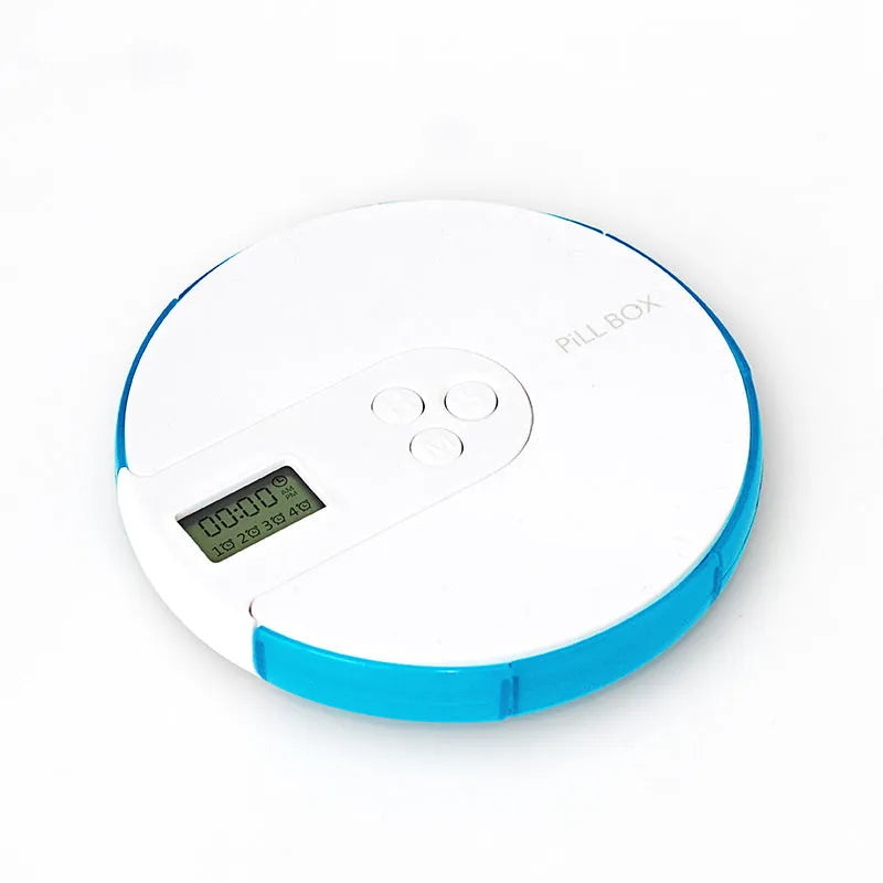 7-compartment alarm clock pill dispenser showing medication organisation with timer display