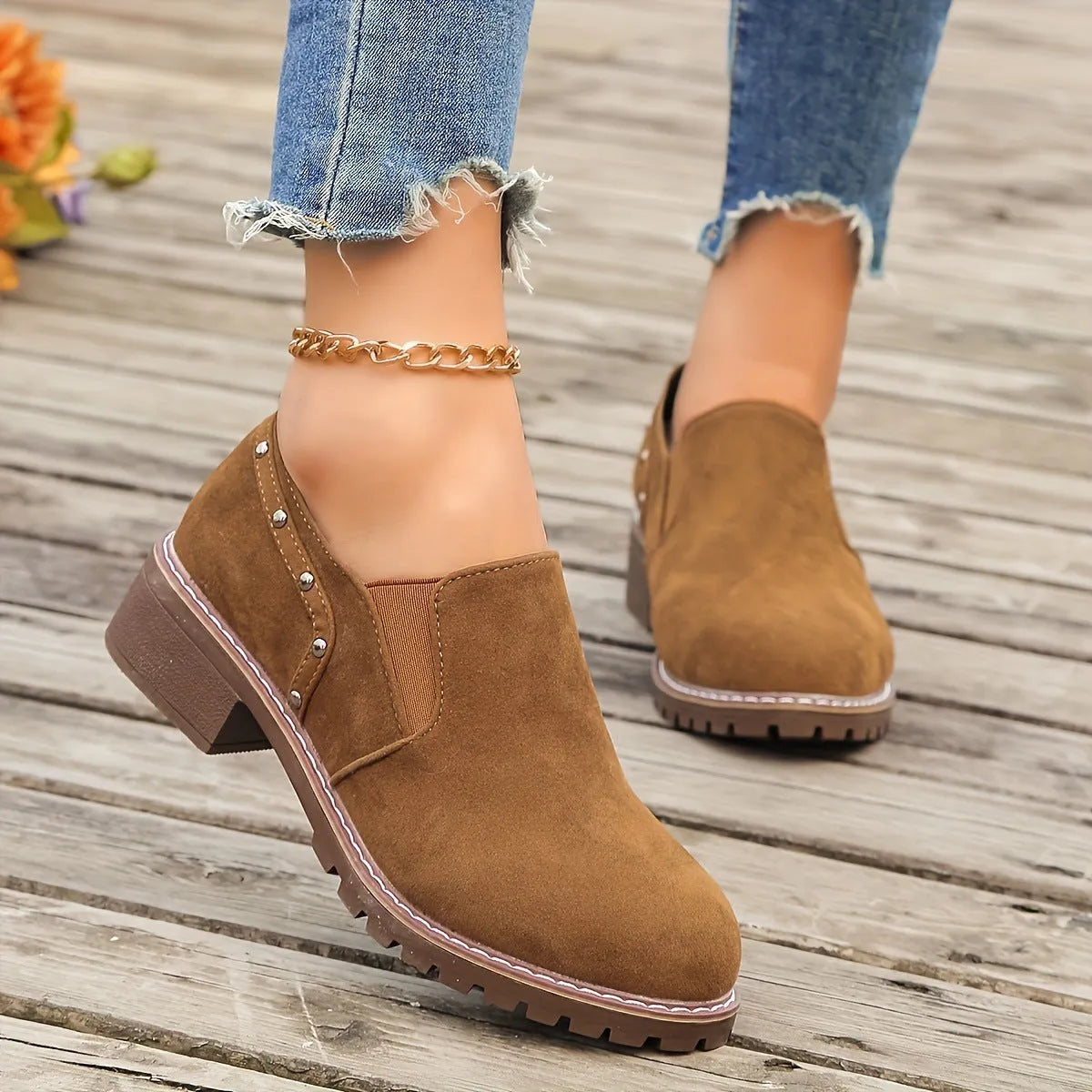Light brown plus size women's suede ankle boots with a thick low heel and elastic band side closure.