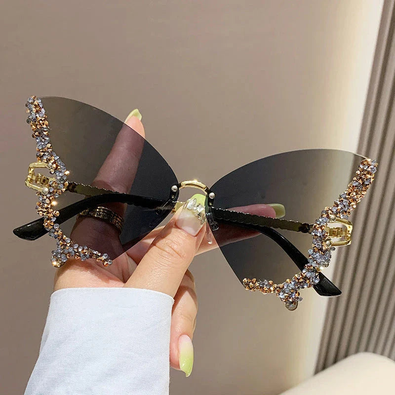 Luxurious diamond-studded butterfly sunglasses with oversized frames and a variety of color options
