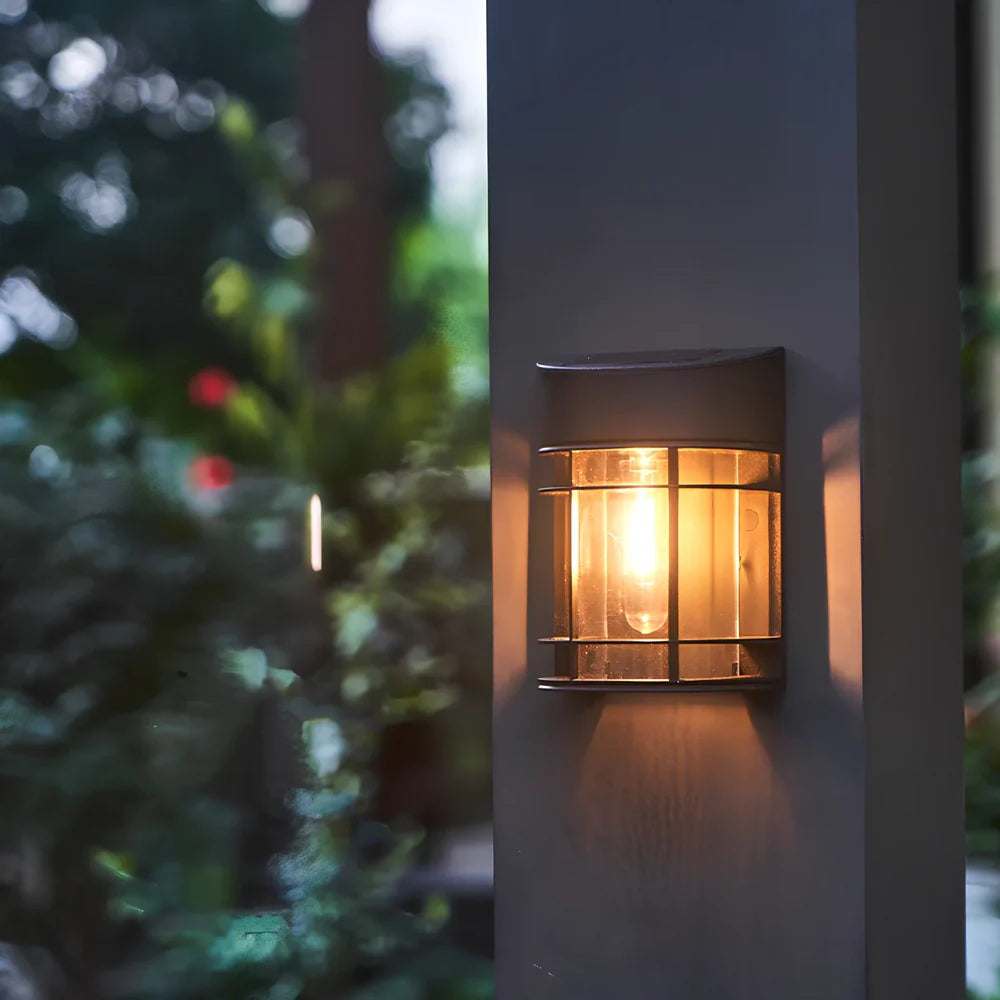 Solar outdoor wall light with warm glow, monocrystalline panel, and IP65 waterproof rating for garden use