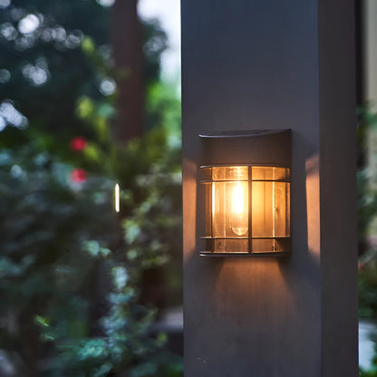 Solar outdoor wall light with warm illumination for garden and patio areas