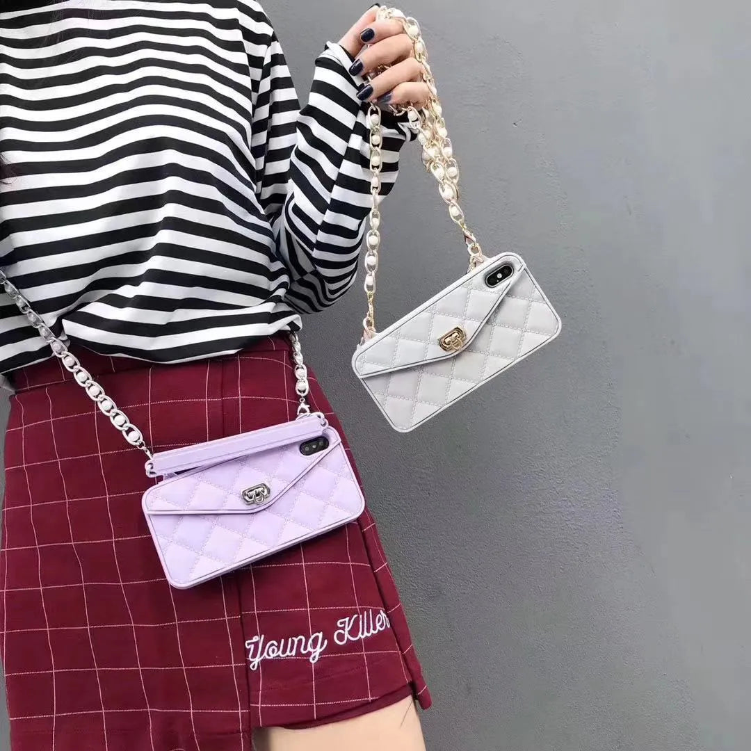 Luxury women's silicone iPhone case with pearl chain lanyard in beige, black, green, khaki, pink, or white