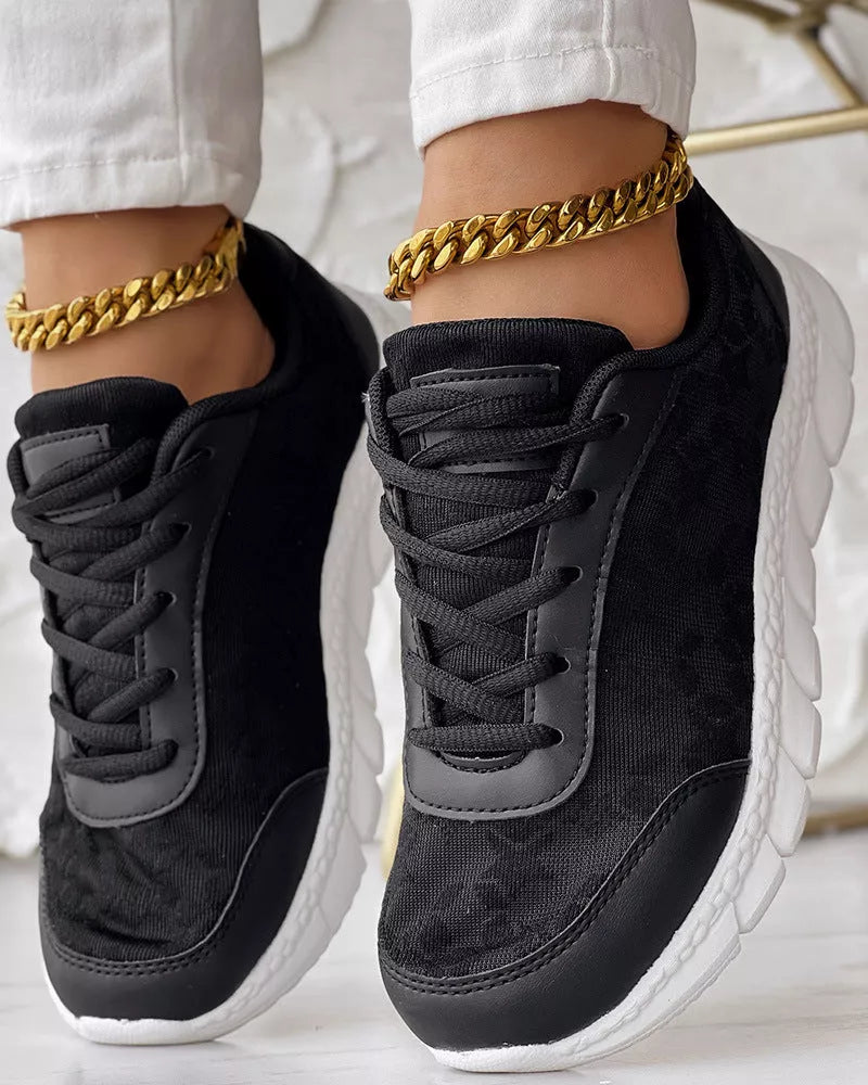 Women's lightweight canvas running shoes in white, black, blue, and pink