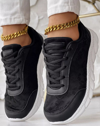 Women's lightweight canvas running shoes in white, black, blue, and pink