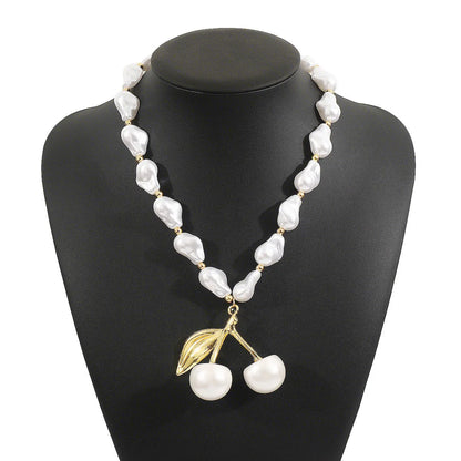 Adjustable 51-60cm alloy necklace with cherry fruit pendant and imitation pearls in gold or white K electroplated finish