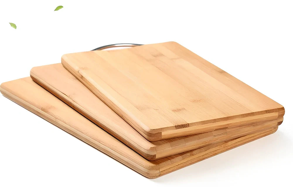 Bamboo cutting board with curved handle showing natural wood grain, rectangular shape with four size options
