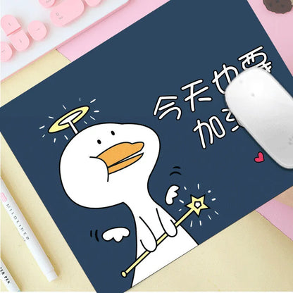 Customisable thick cartoon mouse pad with non-slip base, showing sample patterns like strawberry, cat, and whale designs.