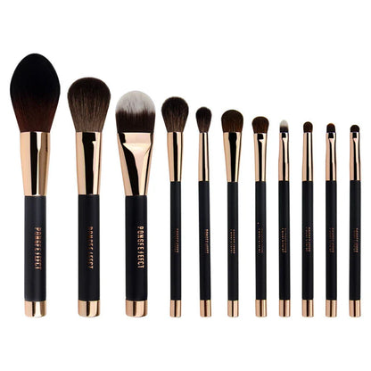A premium makeup brush set with a sleek black and gold design, featuring 11 essential brushes and a magnetic holder for easy organization.