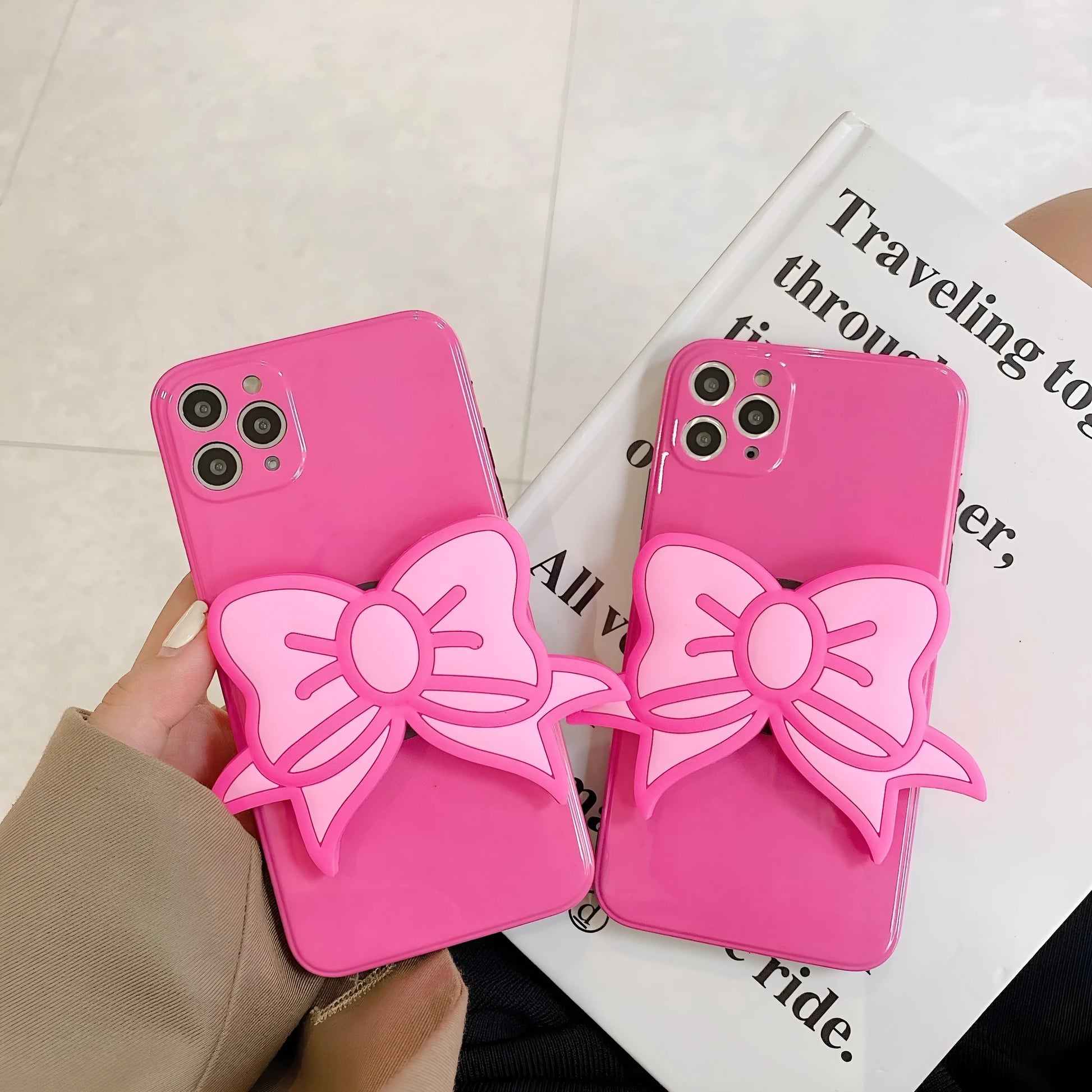 Rose red TPU iPhone case with integrated bow-shaped viewing stand