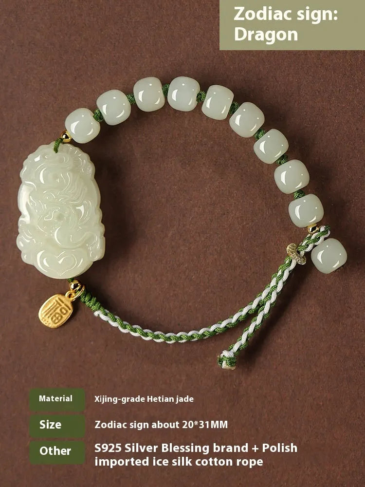 Hetian jade bracelet with a rabbit zodiac charm and S925 silver card on a red ice cotton rope.