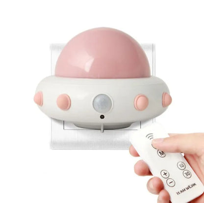 Remote control UFO bedside night light in blue, pink, or white colours with compact 105mm x 76mm dimensions
