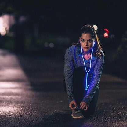 Blue Magic Light LED earphones with aluminium alloy shells and glowing EL lights, connected to a 3.5mm plug