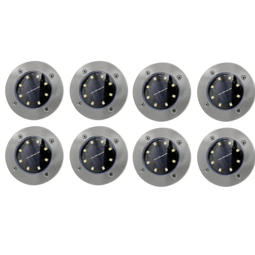 Stainless steel solar garden light with LED illumination for outdoor landscape lighting