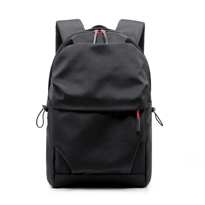 Sleek and durable nylon backpack with spacious compartments for everyday use.