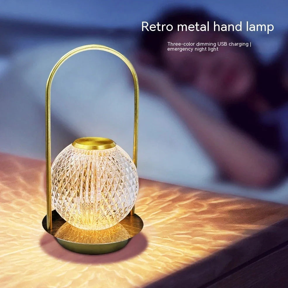 Metal portable ambience light with lantern shape measuring 11×23cm, showing touch controls and 27 colour options