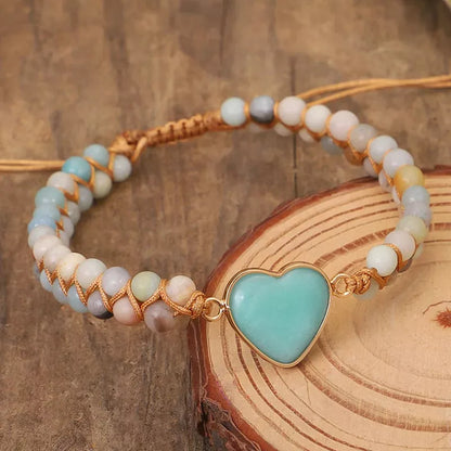 Adjustable heart charm bracelet with blue-green amazonite stones and braided macrame wristband
