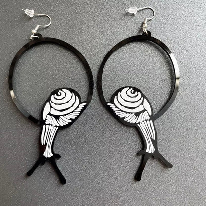 Black acrylic dangle earrings featuring unique animal and zodiac designs, lightweight and stylish.
