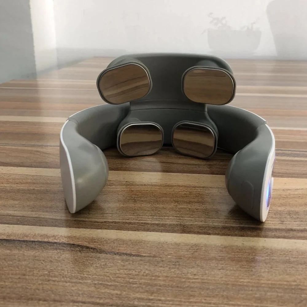 White shoulder neck massager with four rotating heads for mechanical kneading action