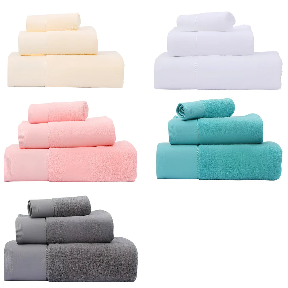 Three-piece cotton towel set showing 70x140cm bath towel, 35x75cm face towel, and 32x32cm square towel with combed yarn texture