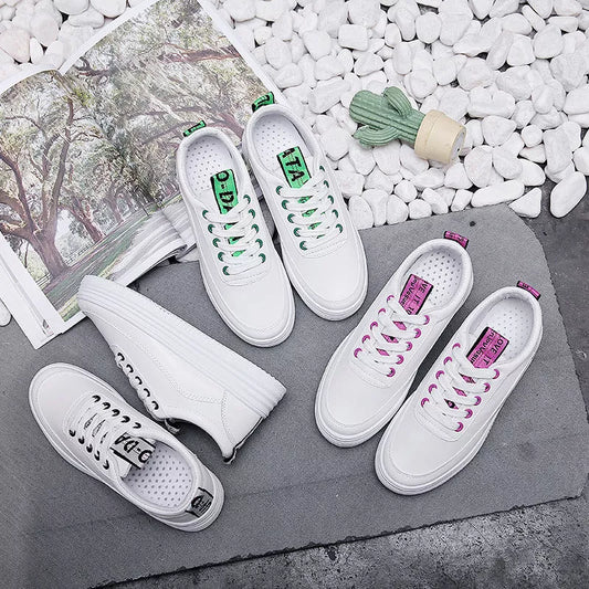 Breathable women's sneakers in black, green, and pink with rubber outsole