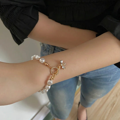 Elegant natural stone and pearl bracelet with a dazzling pendant design, perfect for enhancing any outfit