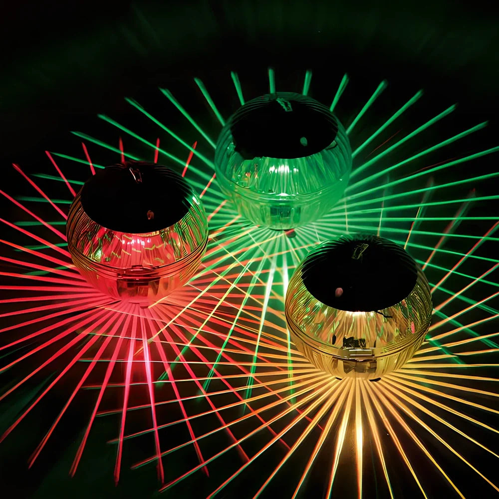 Solar-powered floating pool lights with colour-changing LEDs on water surface