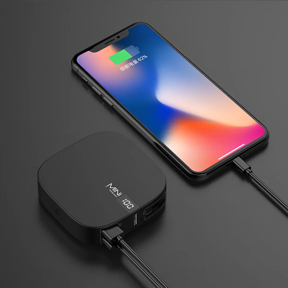 Red 10000 mAh mini power bank with digital display showing battery percentage, measuring 90x64x24mm