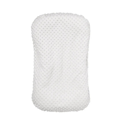 Portable crib with interchangeable fabric cover showing 75x45cm dimensions and multiple colour options