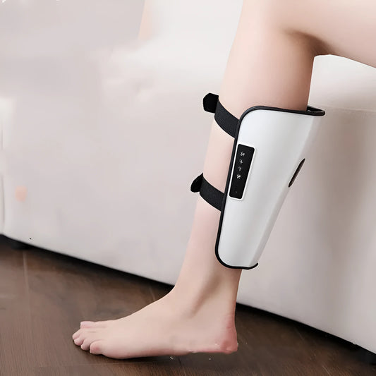 White plastic pulse calf massager with electrotherapy and infrared functions, showing mechanical controls.