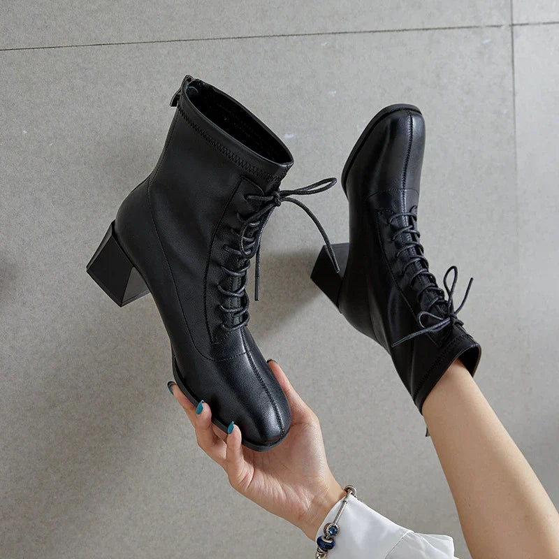 Fashion Heightened Middle Tube Strap Elastic Thin Leather Boots in Black