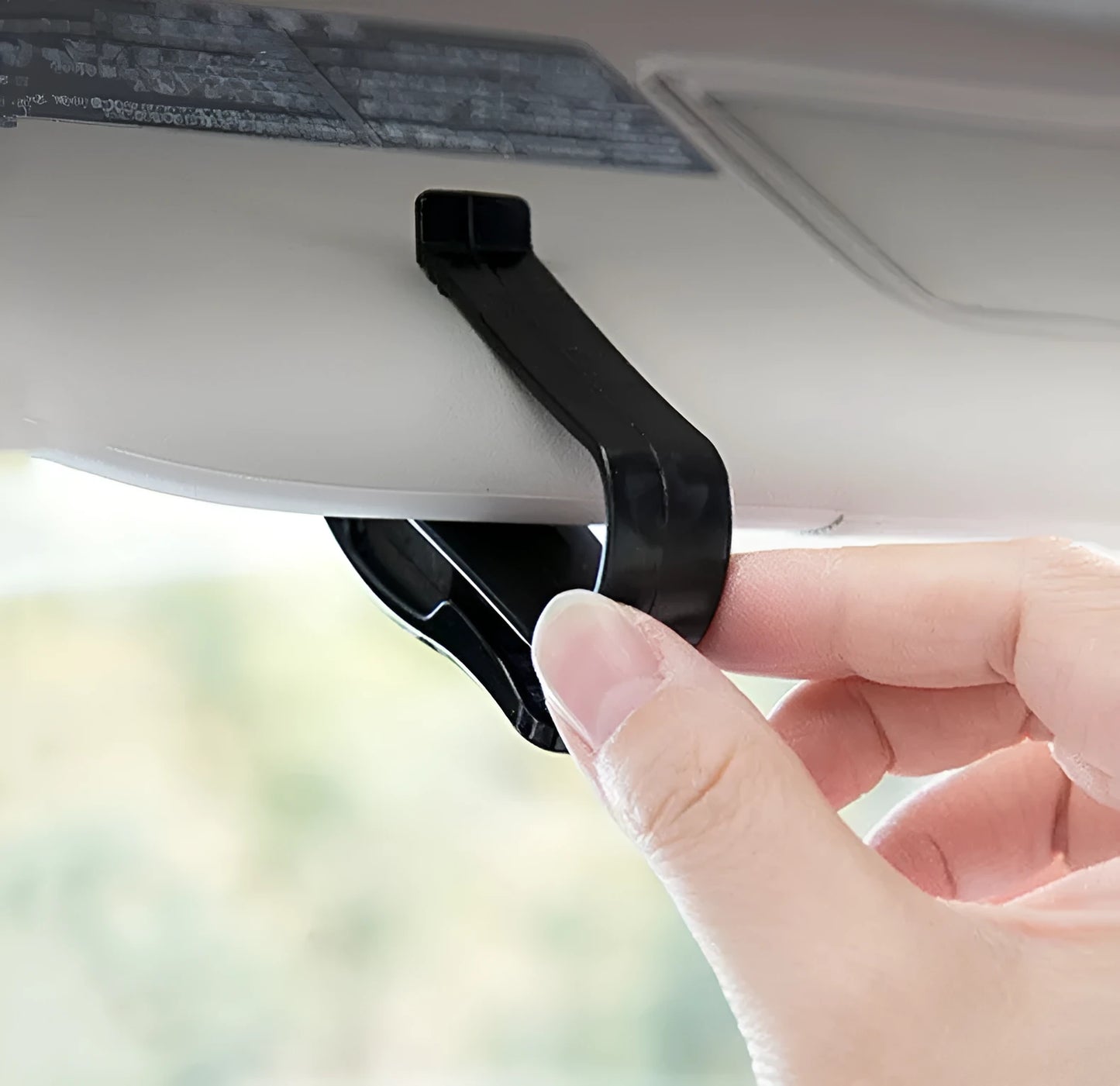Black plastic car sun visor clip for glasses, tickets, and ID cards measuring 6.5cm long