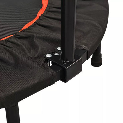 Red and black indoor trampoline with optional safety handrail for kids and adults