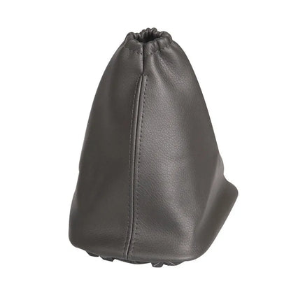 Black leather shift lever dust cover for Toyota Corolla, dimensions 15.2cm by 12.9cm.