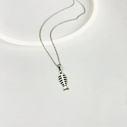 Fishbone pendant necklace with adjustable chain and matching earrings in retro style, showing O-shaped chain design