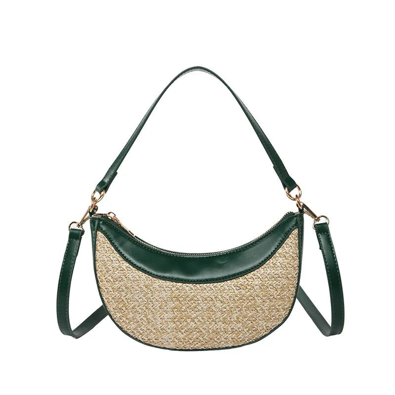 Women's hard-shell straw shoulder bag in a dumpling shape with a crossbody strap, shown in a choice of colours.