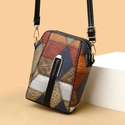 Premium PU leather shoulder bag with trendy stitching details, available in irregular blue with brown or black color options