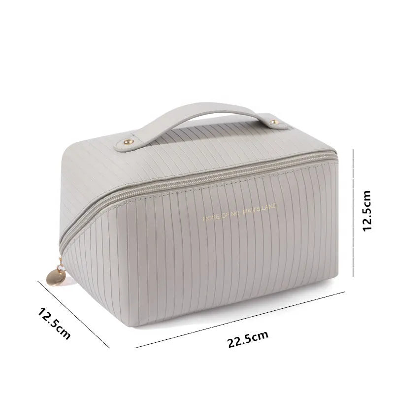 Vertical pattern pillow makeup bag with cubic 22.5x12.5x12.5cm dimensions in beige, black, brown, grey or pink