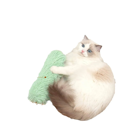 Plush cat toy pillow in blue, green, pink, and white colours measuring 27 by 10 centimetres