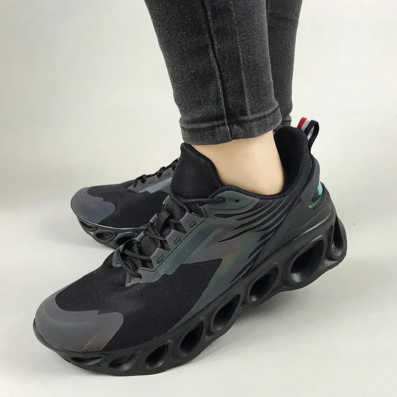 Breathable mesh casual trainers in black colour with lace-up closure and EVA sole