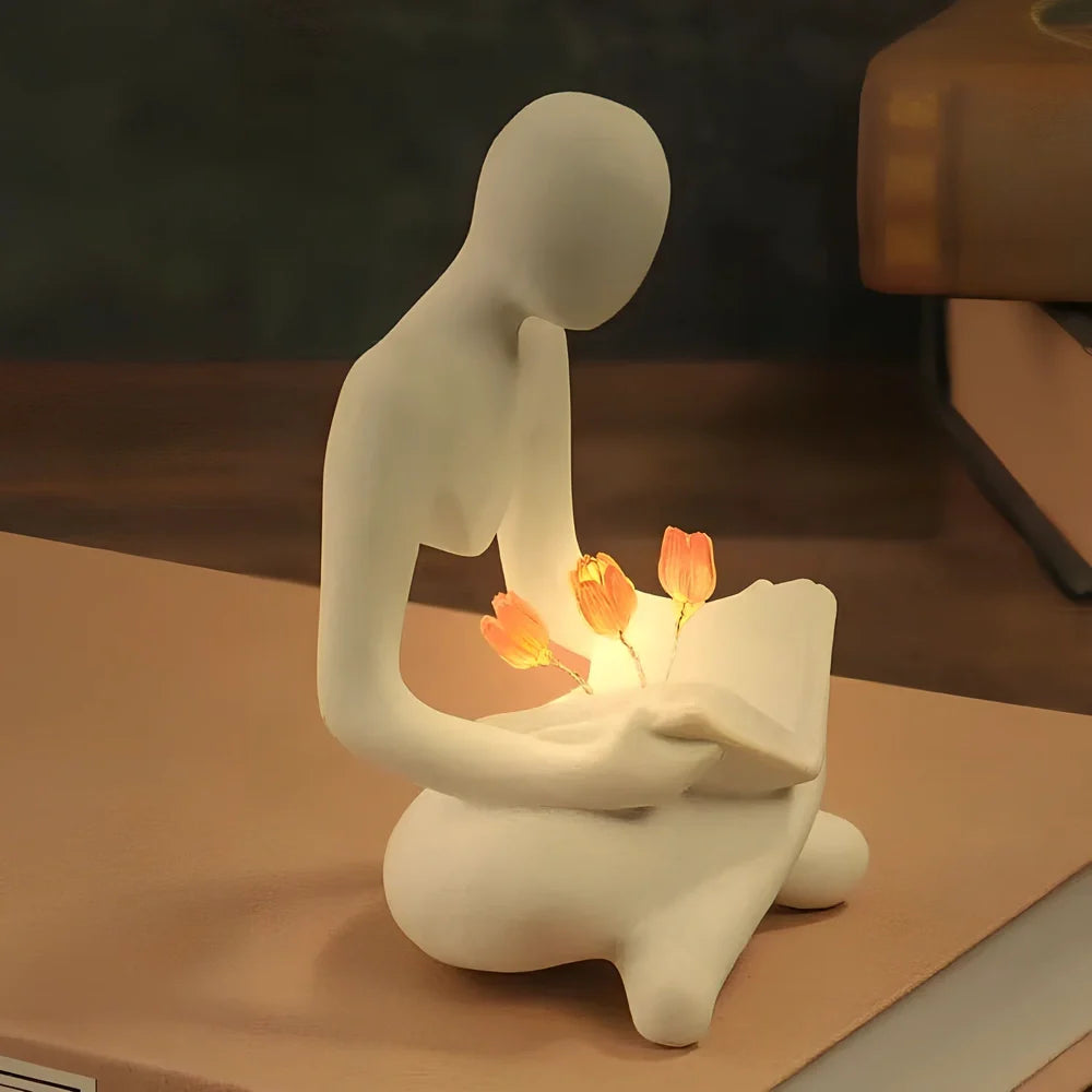 Nordic abstract thinker statue with tulip book night lamp measuring 7x6.3x11.5cm