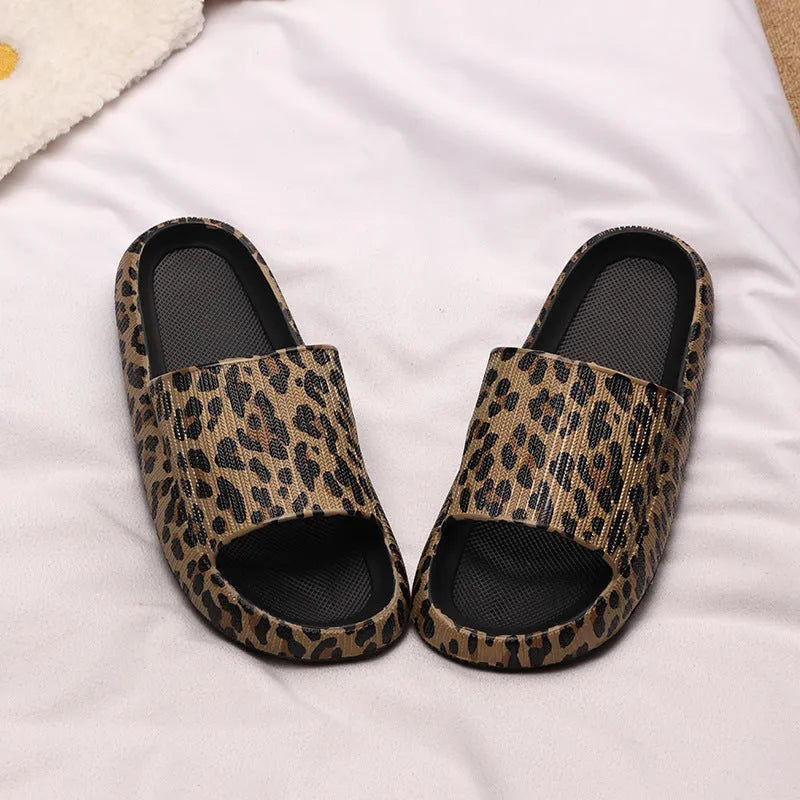 Women's leopard print slippers with a thick EVA sole in multiple colour options on a white background.