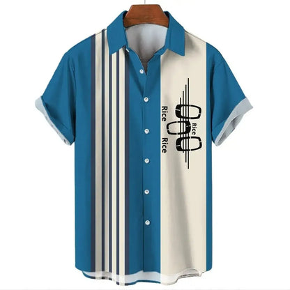 Man wearing a striped short-sleeve Hawaiian shirt with a button-up front in a casual setting.