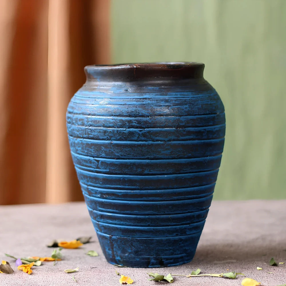 Ceramic mosaic vase with dried flowers, showing mosaic pattern and 25cm height