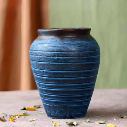 Ceramic mosaic vase with dried flowers, showing mosaic pattern and 25cm height