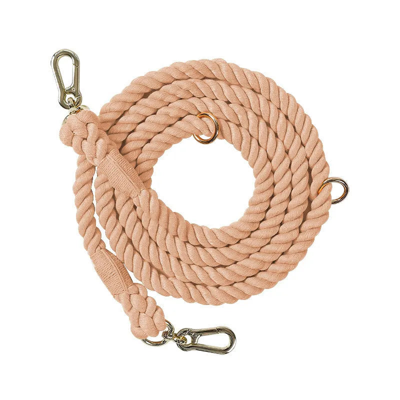 Woven rainbow pattern dog leash with double grip handles and a metal clasp.
