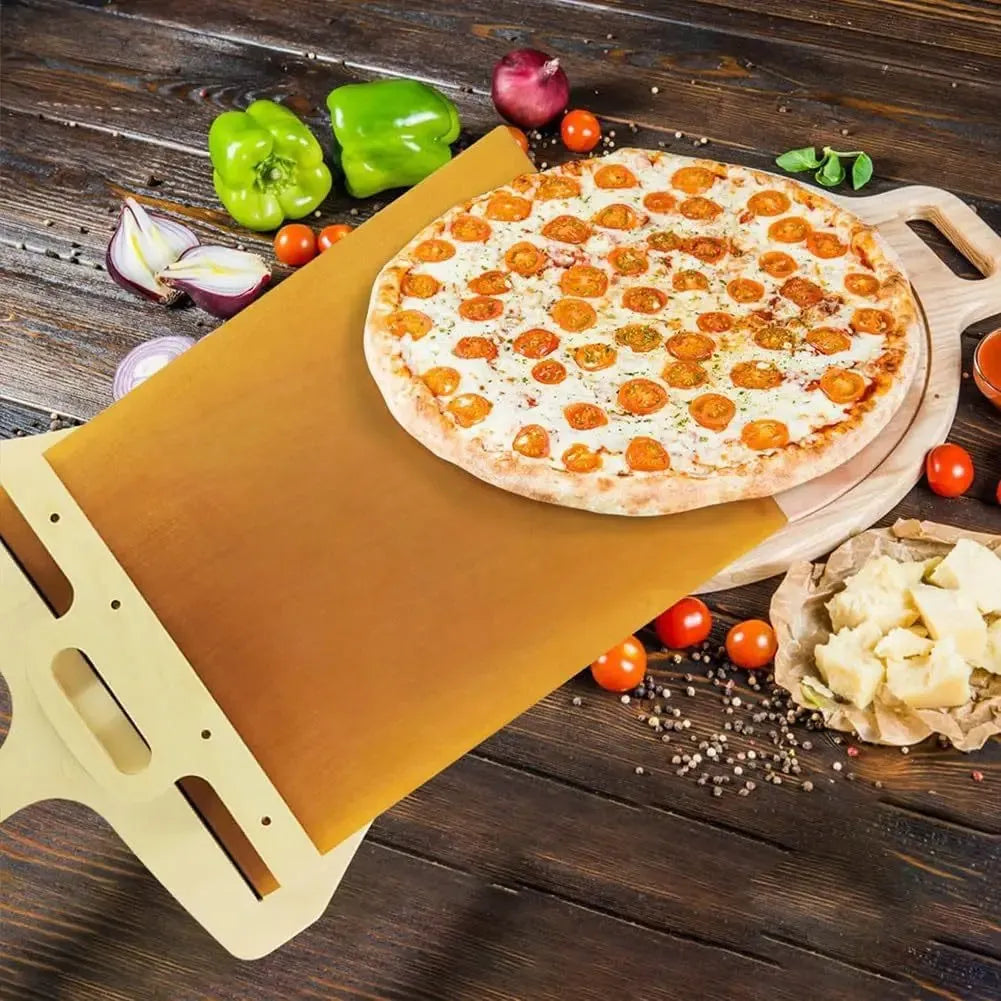 White PP plastic pizza transfer shovel measuring 55cm by 35cm on kitchen counter
