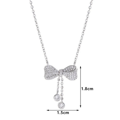S925 sterling silver bow pendant necklace on an O-ring chain, adjustable from 40cm to 45cm.